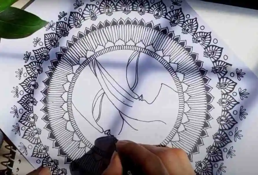 outline profile of Radha Krishna in the center of the circle